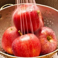 Wash apples with baking soda to remove pesticide
